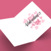 Open pink Valentine's Day card on pink background.