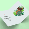 Dinosaur-themed Valentine's Day card with heart and volcano.
