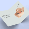 Greeting card with cowboy hat and heart.