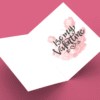 Open Valentine card with roses and message.