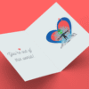 Open card with alien and heart design