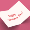 Open Valentine's Day card with red text.