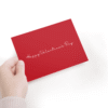 Hand holding Valentine's Day card