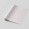 Blank white sheet of semi-rolled paper