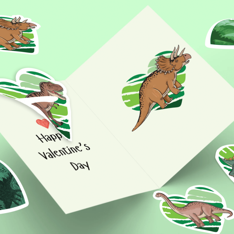 Dinosaur-themed Valentine's Day card with heart stickers.