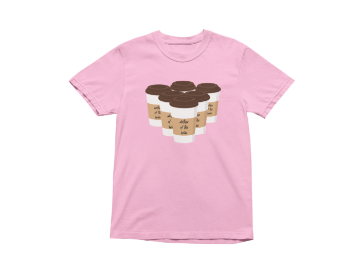 Pink t-shirt with coffee cup graphic design.