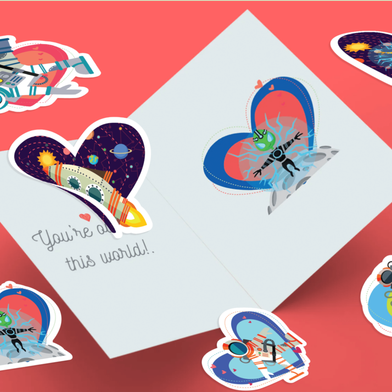 Colorful alien-themed stickers on a greeting card.
