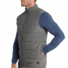 Man wearing gray vest and blue sleeves.