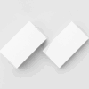 Two blank white business cards on gray background.