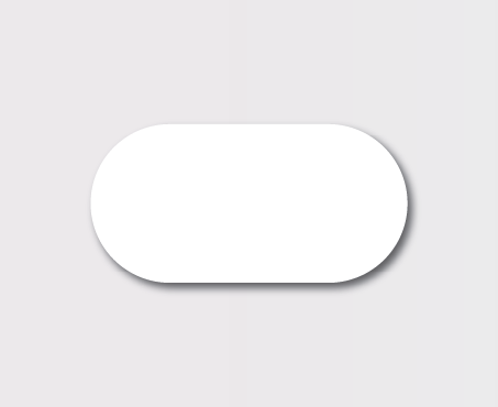 White oval pill on gray background.
