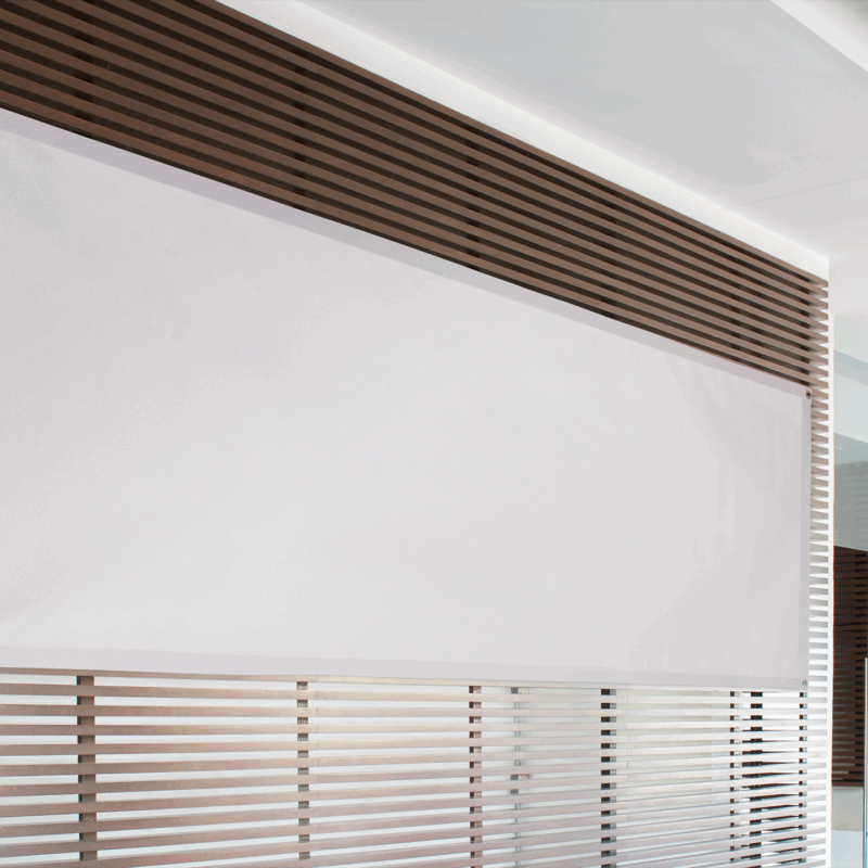 White indoor banner hanging on slatted wall.