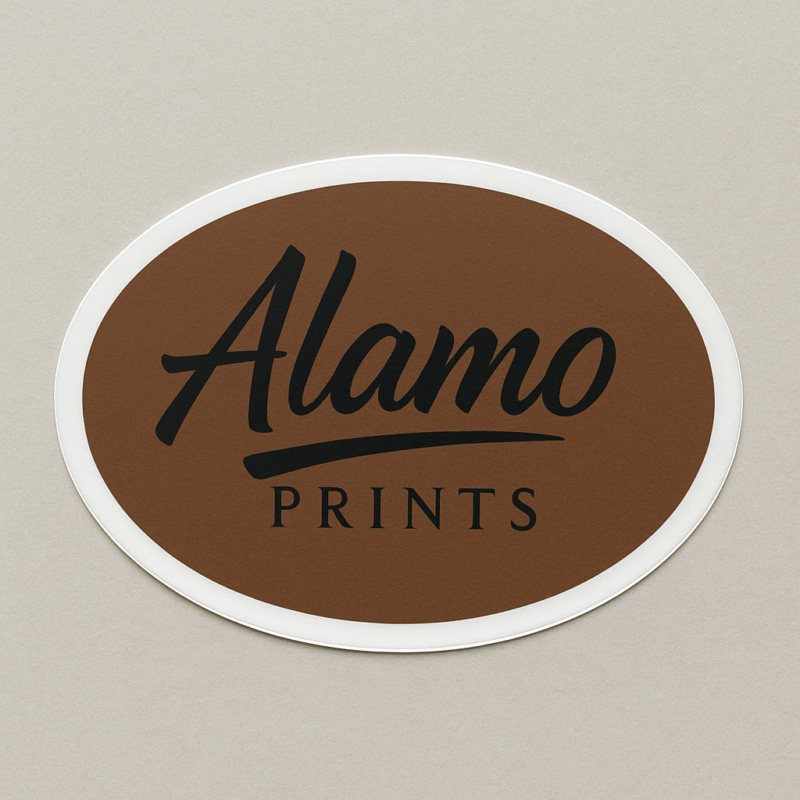 Alamo Prints logo on brown oval background.