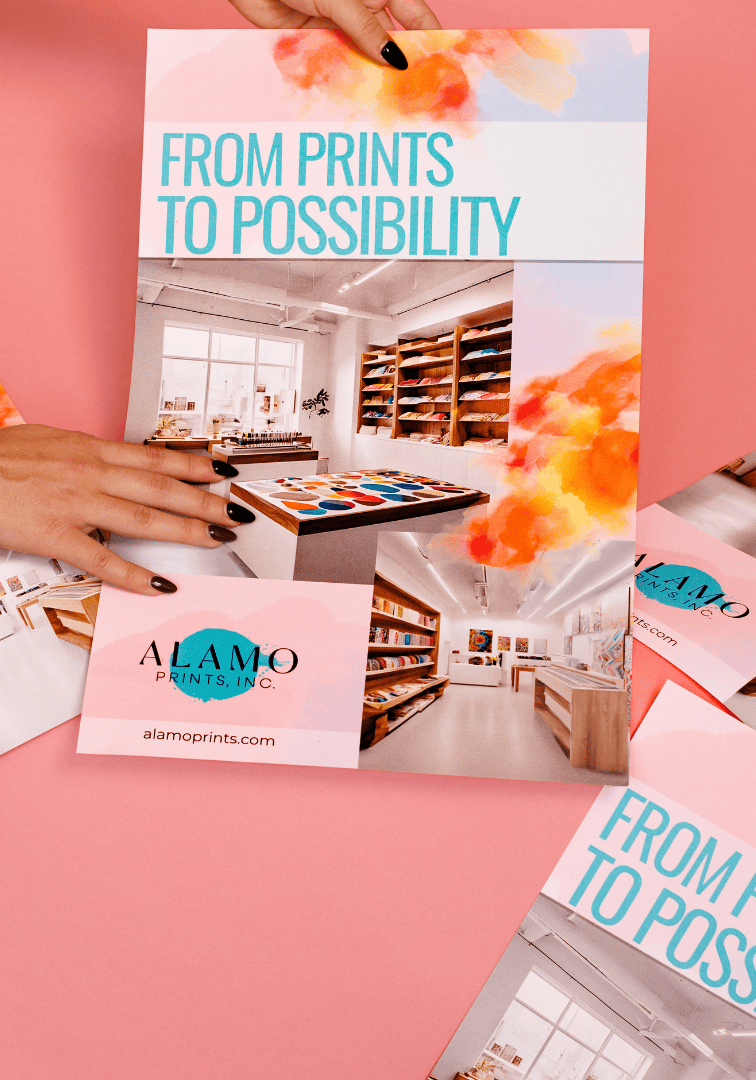 Colorful print shop promotional materials on pink background.